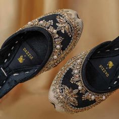 It's like a halo of spun gold, incandescent with a love for life and pleasure. From the start till the end, I'm a companion that is always steadfast by your side. Upper and Back: Jamavar with Embellished Velvet Patchwork Inner Lining: Velvet texture for luxurious comfort Cushioning: Double padded sole Sole: Natural Leather 👉HOW TO MEASURE YOUR FOOT You can refer to our size chart to select your perfect jutti size. If you are confused about what size to order, measure your feet. Draw the outline Juti Shoes Pattern, Gold Flats With Round Toe For Party, Gold Round Toe Flats For Party, Gold Flats With Gota Work For Parties, Embellished Gold Flats For Party, Gold Flats For Party And Festivals, Gold Party Flats For Festivals, Gold Gota Work Closed Toe Flats, Gold Closed Toe Flats With Gota Work