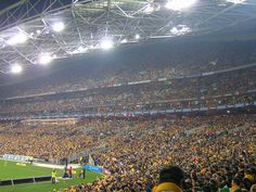 a large stadium filled with lots of people