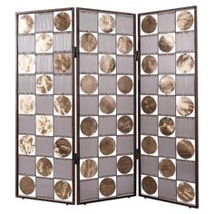 a room divider with multiple circles on it