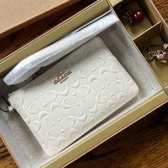 Brand New In Box And Still Wrapped By Manufacturer. Small 6x4 White Coach Wristlet With Apple And Heart Charms. Coach Wristlet, Heart Charm, Coach Bags, Clutches, Color White, Charms, Brand New, White, Quick Saves