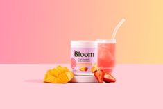 a pink and yellow background with strawberries, oranges, and a jar of bloom