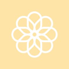 a white flower on a yellow background