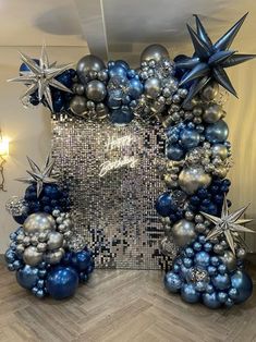 blue and silver christmas decorations in the shape of stars