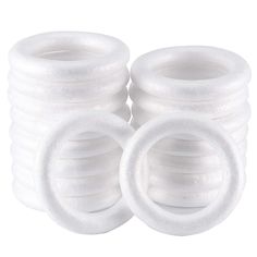 six white foam rings stacked on top of each other