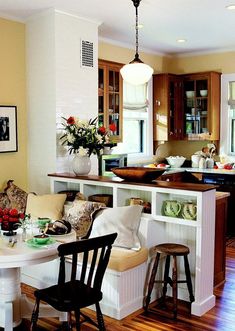 the kitchen is clean and ready to be used as a breakfast nook or bar