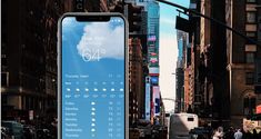 an iphone with the weather app displayed on it's screen in new york city