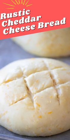 a close up of bread on a pan with the words rustic cheddar cheese bread