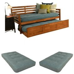 a futon bed with pull out trundle and storage underneath it, in two different views