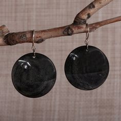 Enjoy the night under a moon of powerful darkness. Armenia's Sergey Chobanyan works with round obsidian jewels in a black hue to create this stylish pair of dangle earrings, whose comfortable sterling silver hooks display the gems in all their mystic, natural splendor. Bohemian Obsidian Jewelry With Natural Stones, Adjustable Bohemian Obsidian Jewelry, Unique Handmade Obsidian Jewelry, Elegant Hand-strung Obsidian Jewelry, Obsidian Earrings, Obsidian Jewelry, Mens Jewelry Necklace, Black Jewelry, Modern Earrings