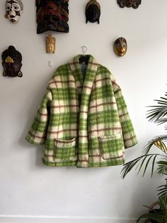 Elevate your winter wardrobe with our Green Checkered Oversized Wool Coat! 🍃 Handcrafted from a vintage Dutch woolen blanket, this cozy masterpiece brings together warmth, style, and sustainability. Imagine wrapping yourself in the soft embrace of chunky wool, with a touch of nostalgia from the blanket's history. 🧥✨ Key Features: ✂️ Handmade with love 🌍 Upcycled vintage Dutch wool 🧣 Oversized for ultimate comfort 🌈 Green checkered pattern ♻️ Lined with leftover fabric for a unique twist 📦 Two spacious pockets for practicality Sizing: Size Medium, but can also be worn with size Large cause it's an oversized fit. I wear it in the pictures with size Small.  Whether you're strolling through the city or sipping cocoa by the fireplace, this one-of-a-kind coat is your winter essential. Embr Cozy Blanket Jacket, Wool Blanket Upcycle Queen, Blanket Winter Coat, Pattern For Blanket Coat, Wool Coat Outfits, Blanket Upcycle, Wool Blanket Upcycle, Funky Fits, Wool Blanket Coat