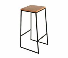 a wooden and metal stool on a white background with the seat folded back to form a rectangle shape