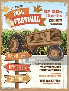 an old fashioned farm tractor with fall festival signs