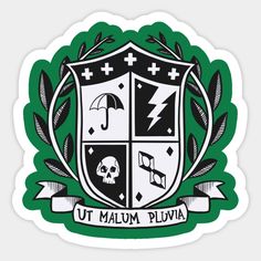 an emblem with the words, ut maum plovia and two skulls on it