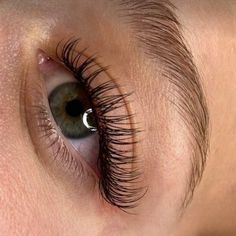 a woman's eye with long lashes