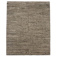 an area rug with black and white lines on the ground, in front of a white background