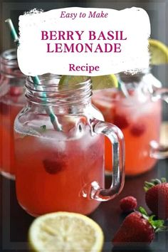 berry basil lemonade recipe in mason jars with strawberries and lemons on the side