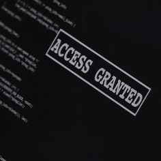 a computer screen with the words access granted printed on it's back side