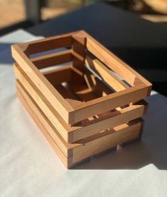 a wooden crate sitting on top of a table