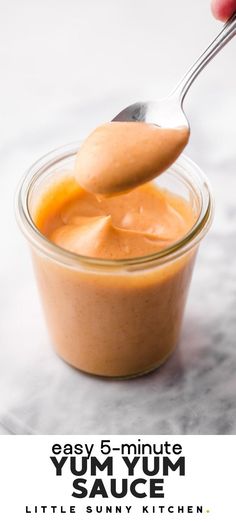 a spoon full of sauce with the words 5 minute recipe easy yum sauce