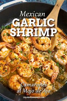 mexican garlic shrimp is cooking in a skillet with a wooden spoon on the side