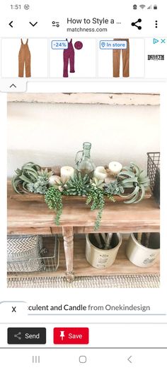 a wooden table topped with potted plants on top of it's side shelf