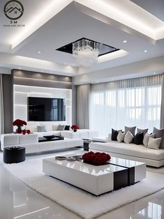 a modern living room with white furniture and red flowers on the coffee table in the center