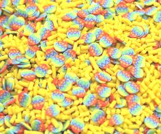 yellow and blue candies with hearts on them are all over the place for decoration