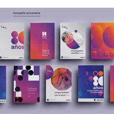 an assortment of brochures designed to look like abstract shapes and colors are shown