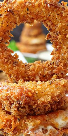 fried onion rings stacked on top of each other