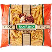 a bag of penne with two people in the back and one person standing behind it