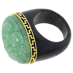 Kwan Collections Gold-Plated Floral Carved Jade Ring  Flaunt your unique style when you accessorize with this bold, hand-carved jade ring. The beautiful piece features the chic color contrast of green and charcoal jade embellished with an intricate floral carving and gold-plated accents for a luxe, one-of-a-kind look!       Approx. 3/4"L x 1"W x 9/16"H; shank 5/16"W     Stamped .925; yellow gold plating     Jade carved ring has oval-shaped green jade top carved in floral design set atop charcoal Luxury Green Intaglio Rings, Elegant Ceremonial Gemstone Rings, Elegant Ceremonial Rings With Gemstone, Elegant Green Intaglio Ring, Luxury Carved Jewelry For Formal Occasions, Luxury Ceremonial Gemstone Jewelry, Luxury Ceremonial Jewelry With Polished Finish, Ceremonial Luxury Jewelry With Polished Finish, Luxury Green Jewelry With Polished Finish