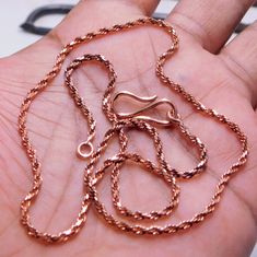 Total Weight: 8 grams Total Weight: 7 grams  Flat Cable Chain -5MM Metal : Copper Necklace Thickness of the  Rope chain 2 mm & 3MM 100% Pure Copper Chain Necklace Copper Chain Necklace Length ,16,18,20,22,24 inches The necklaces made of copper are made by me in my home factory. Unique and handcrafted, picture of the original item. Makes a Wonderful Gift for your Girlfriend, Wife, Mom or Simply an Excellent Addition to Your Jewelry Collection. As a metal, Copper  has significant health benefits that have been used across cultures for centuries. Copper has a proven track record as a powerful antimicrobial agent fighting infections and aiding in cold and flu prevention, wound healing, and more. Copper also helps with internal heat regulation and circulation. We accept custom and personalized Copper Chain Jewelry Gift, Gold Copper Chain Necklace As Gift, Gold Copper Chain Necklace For Gift, Handmade Copper Jewelry, Copper Chain Necklace, Copper Jewelry Handmade, Chain Diamond, Rope Chain Necklace, Necklace Chain Lengths