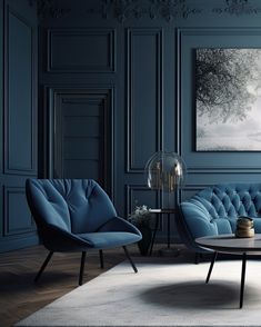 a living room with blue couches and a round coffee table in front of a painting