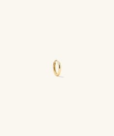 As basic as your white tee. This is our lightest hoop, perfect to wear every single day. Featuring a hinge clasp makes it easy to wear and put on. Sold individually. Amsterdam Style, Earring Hoops, Mini Hoop Earrings, Yellow Gold Jewelry, Pearl Hoop Earrings, Sell Gold, Diamond Hoop Earrings, Engraved Items, Yellow Gold Earring