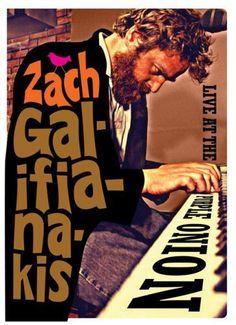 a man sitting at a keyboard with the words zach gal - fifa - na'kis on it