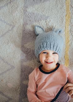 Our sweet bunny hat is perfect for new spring babes. These have a nice fit around the base of the hat that keeps it from getting stretched out. The color in the ears is such a simple but cozy detail. Bailey Bunny comes in three different colors: choose between White with Gray ears, White with Pink ears or Gray with White ears. Any color you decide will have you ﻿hopping﻿ with joy. Photo by: @andrea.coonrod Bunny Hat, Ear Design, Hand Knit Hat, Lake City, Salt Lake City, Warm And Cozy, Hand Knitting, Knitted Hats