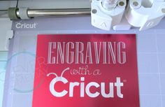 a red sign that says engraving with a cricut