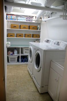 a washer and dryer in a small room