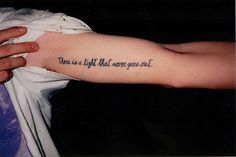 a person with a tattoo on their arm that says, you're right there you are