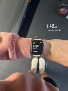 an apple watch on someone's wrist in the gym