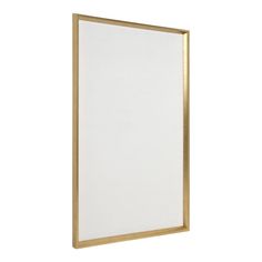 a white and gold framed wall hanging on the side of a wall with an empty frame