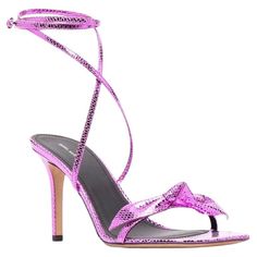 Step into the spotlight with the Isabel Marant Purple Leather Heel Sandal – a pair of heels that redefine fashion with a bold and vibrant twist. These heels aren't just shoes; they're a statement, a bold declaration of your style, and a testament to Isabel Marant's creative genius. The metallic purple snakeskin motif on these heels is nothing short of extraordinary. It catches the eye and draws attention wherever you go. It's not just a pair of shoes; it's a work of art that adorns your feet. Th Versace Dress, Leather Heels Sandals, Chanel Sunglasses, Purple Leather, Heel Sandal, Bold Fashion, Isabel Marant, Leather Heels, Snake Skin