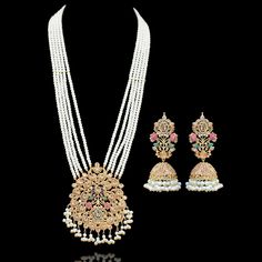 Emanate luxury and royalty in our Sara Set that can elevate any ensemble! A vibrant set brilliantly dispersed with champagne, ruby and emerald stone work and is balanced with pearl moti clusters. The set includes a mala, a maang teekah and a pair of beautiful earrings. Approximate mala length is 15" and approximate earrings length is 3.5". Gold-plated on high-quality brass as base metal. Made by order. Kindly allow 5-7 weeks for the delivery of this item. For custom or urgent requests, please co Moti Sets Jewellery Gold, Moti Sets Jewellery, Unique Gift Cards, Faux Stone, Stone Work, Emerald Stone, Champagne Color, Base Metal, Free Giveaway