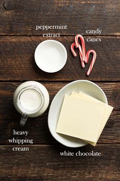 ingredients to make white chocolate on a wooden table with milk, sugar and candy canes