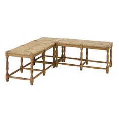 a set of three wooden benches sitting next to each other on top of a white floor