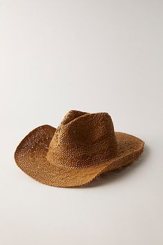 The coolest take on a forever classic, this timeless cowboy hat is featured in a straw fabrication and staple silhouette with dipped crown and adjustable sides for an always flattering fit. **Features:** Classic silhouette, straw fabrication, adjustable sides **Why We ❤ It:** The ideal piece to pair with absolutely any look, this super versatile hat is sure to be a staple in your accessories collection for countless years to come. | Candy Woven Cowboy Hat by Free People in Tan Boho Cowboy Hat, Straw Cowgirl Hat, Safari Chic, Straw Cowboy Hat, Cowgirl Hats, Equestrian Style, Aesthetic Fashion, Western Fashion, Boho Outfits