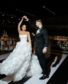 a bride and groom dancing at their wedding reception