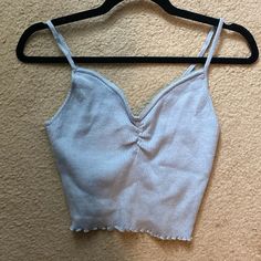 Baby Blue, Size M, Never Worn, Great Condition Affordable Light Blue Trendy Tank Top, Cute Light Blue V-neck Top, Cute Cheap Blue Tank Top, Cute Cotton V-neck Crop Top, Light Blue Crop Top Tank Top For Summer, Casual Light Blue Crop Tank Top, Light Blue Casual Crop Tank Top, Blue Summer Crop Top Tank, Blue Tank Top Outfit