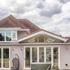 a house with a covered patio in front of it