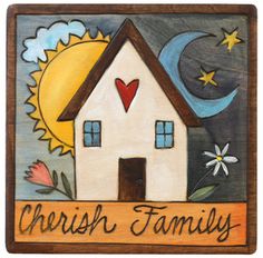 a wooden sign with a house and flowers on it that says,'cherish family '